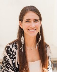 Jacquelyn Myrin, photographed outdoors in patterned clothing.